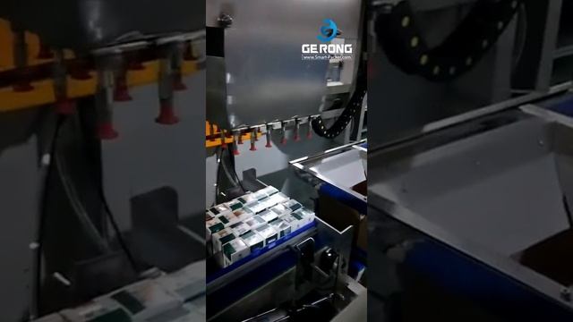 Brick milk bottle box robot hand cartoning machine running video