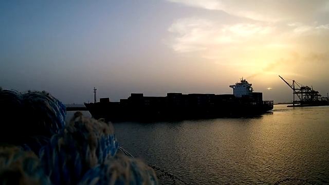 Контейнеровоз выходит из порта. Lome Togo. Container vessel. Go out from the port.