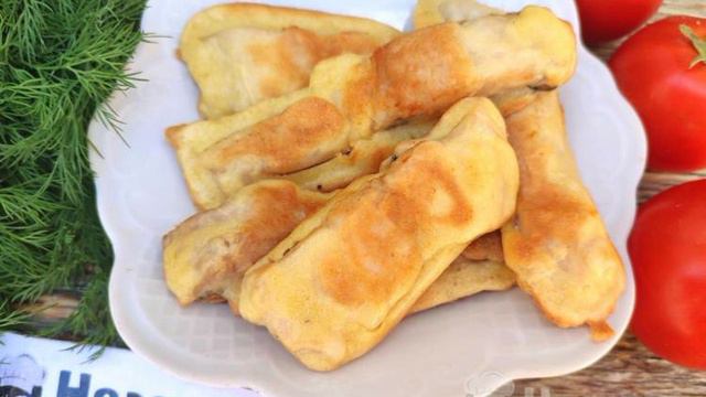 Жареный карп кусочками в кляре на сковороде