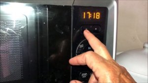 How to set clock on a Hotpoint Microwave Oven