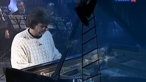 А. Л. Рыбников исполняет музыку к фильму "Тот самый Мюнхгаузен"
