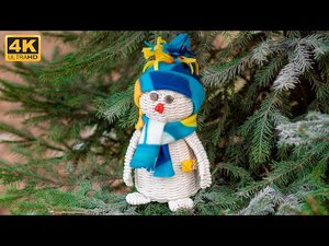 Снеговик из бумажных трубочек.