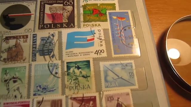 Филателия. Листая старые страницы альбома с марками Польши. смотреть онлайн