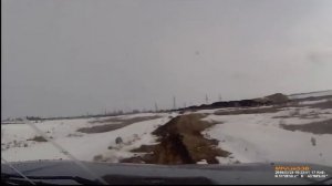 Нива по весенней грязи