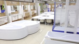 Как правильно установить ванну: до или после укладки плитки?