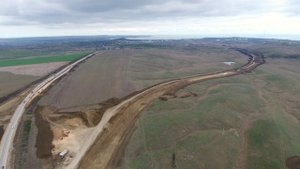 Крымскій мостъ 4К: Строительство автоподходовъ. Развязка у трассы