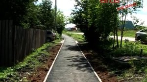 По Первомайской положили "мягкий" тротуар