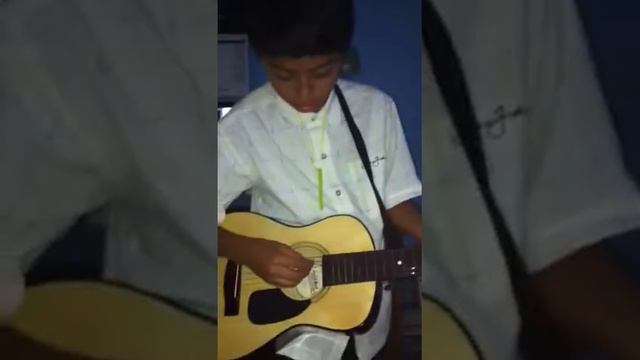 Alan's first time playing guitar