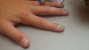 Boys getting their nails painted.