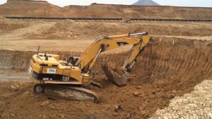 Caterpillar 365CL Excavator Loading Mercedes Actros 4141 And 4140 Trucks