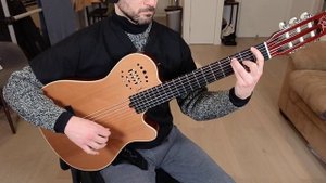 Godin Multiac Grand Concert Deluxe plugged in