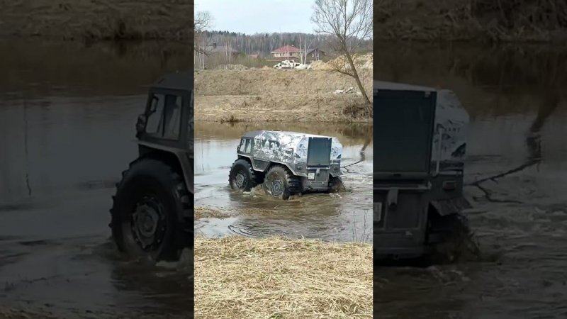 заехал в реку на вездеходе. несет течением