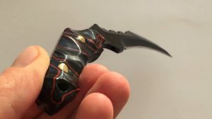 Нож для охоты , рыбалки ручной работы- Нож керамбит Раптор с киринитом текущая лава.