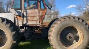 White 4-150 plowing hay field