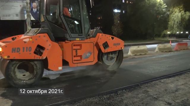 На улице Нормандия-Неман закончились работы по нанесению выравнивающего слоя асфальтового покрытия смотреть онлайн