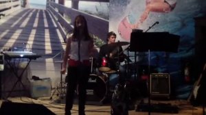 Laura singing "Girl on Fire" by Alicia Keys