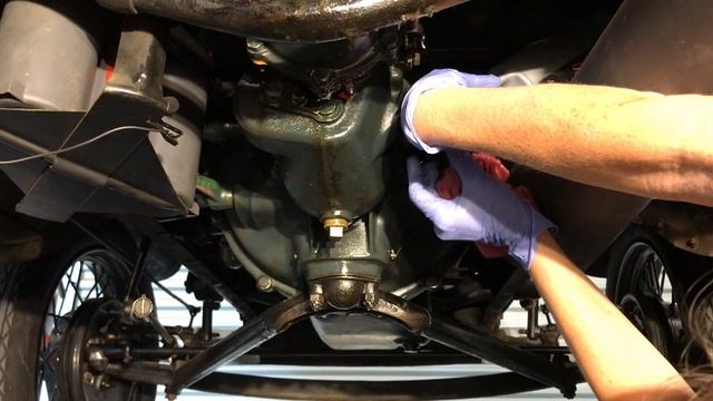 Girl services her Ford Model A - change oil, check fluids, cold start & drive.