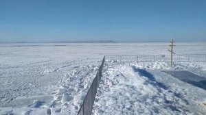 прогулка по набережной/ люди отмечают праздник крещения.