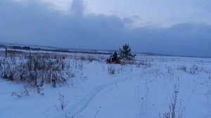 электроскутер зимой на шипах