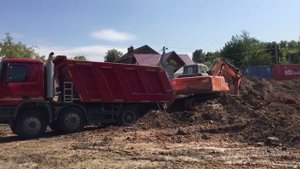 Вывоз грунта по цене 450р  за куб