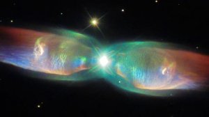 Galactic wings of the twin jet nebula The universe was studied by the Hubble space telescope