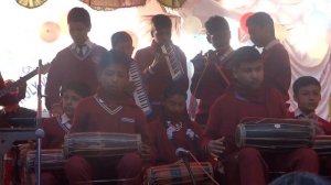 holy vision school children playing madal
