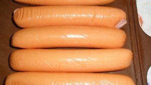 Сосиски на решетке в духовке в томатно-чесночном маринаде