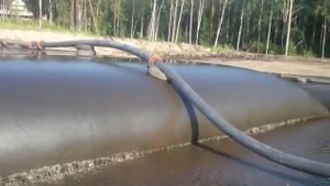 Применение виброплиты для ускорения водоотдачи геотубы "GeoGreen TUBE (ГеоГрин ТУБ)".