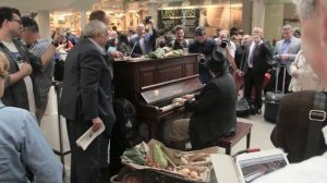 Chas Entertaining Commuters at Kings Cross St. Pancras