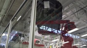 Роботы на заводе Tesla