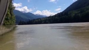 Great River Fishing: Tourist Catches a White Sturgeon on the Fraser River