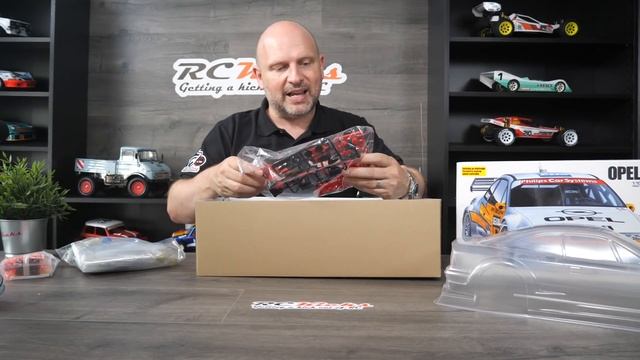 Unboxing The New Tamiya Opel Calibra V6 TA02 Vintage RC Car 2021 Reissue. Kit 47461