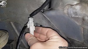 Cleaning or Replacing the Front ABS Wheel Speed Sensor - Peugeot 307