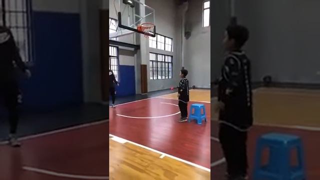 G.Cole Teaches Shooting to Chinese Student