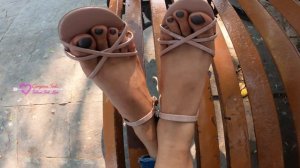 Indian Feet Toe Dangling While relaxing in Park