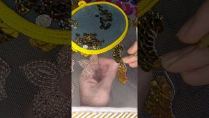 Вышивка люневильским крючком, пайетками. Тамбурная техника. Лепестки будущего цветка.