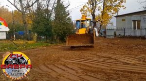 Планировка участка экскаватором погрузчиком JCB