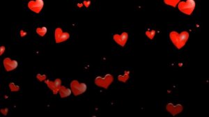 Видеофон летающие сердечки на черном фоне Videophone flying hearts on a black background