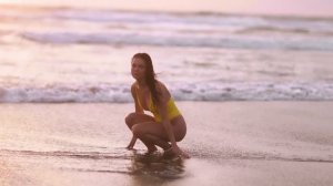 Swimsuit Model Hailey Rayk Playing Around the Beach