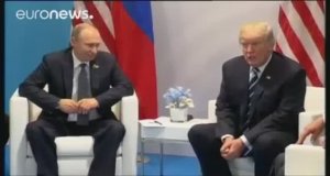 Первая встреча Путина и Трампа