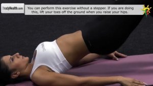 Buttocks workout for women and men: glute bridge on a stepper