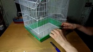 Клетка для Амадин или защита от шелухи вокруг нее