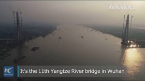 Mega project of the widest bridge over Yangtze River enters crucial stage