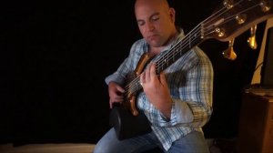 Michael Manring cover. Unspoken on piccolo bass guitar