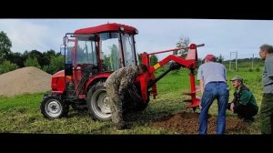 Установка бура на трактор DONG FENG 244 с кабиной и процесс его работы.