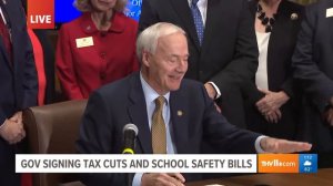 Gov. Asa Hutchinson signs tax cut, school safety legislation