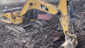 Caterpillar 374D Excavator Loading Mercedes And MAN Trucks - Interkat SA