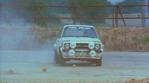 Sir Jackie Stewart drives a Ford Escort RS1800 Rally Car