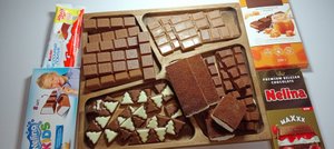 Асмр звуки/распаковываю и раскладываю шоколад ???