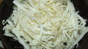 Капуста тушеная с куриными сердечками